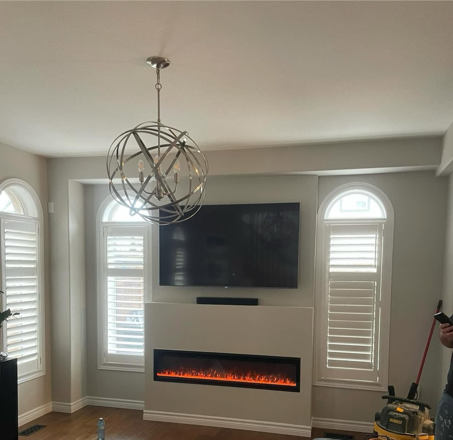 Renovated living room with a linear fireplace feature wall
